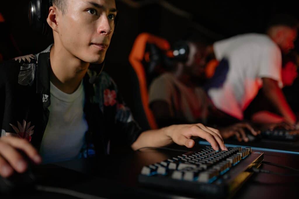 close up of a man playing computer